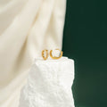 Éclat — Boucles Huggie